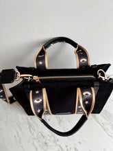 Cargar imagen en el visor de la galería, Lefranco Tote Bag CHICA negra con cinta ojitos dorado
