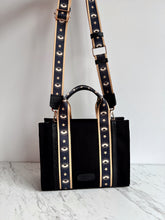 Cargar imagen en el visor de la galería, Lefranco Tote Bag CHICA negra con cinta ojitos dorado